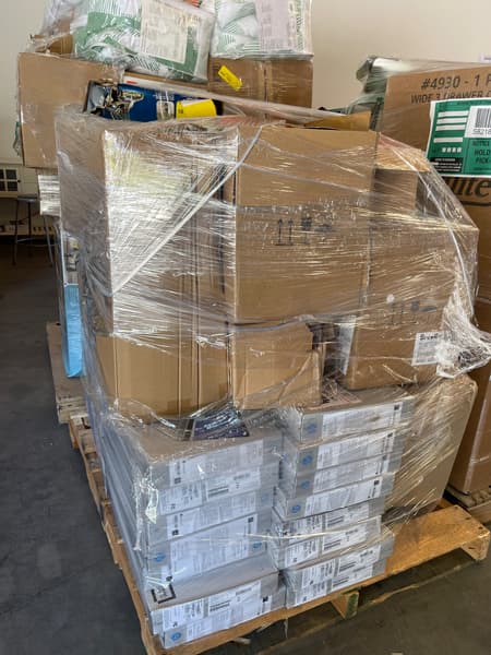 Picture of a pallet with a tower of retail boxes